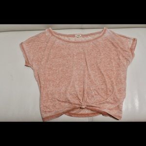 Blush-pink colored crop top